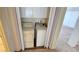 Convenient laundry area with washer and dryer, tucked away behind folding doors at 7053 Magic Moment Ln, Las Vegas, NV 89119