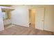 Spacious main bedroom featuring plush carpeting, ensuite bathroom, and ample closet space for comfortable living at 7053 Magic Moment Ln, Las Vegas, NV 89119