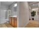 Neutral bathroom with a tub and a vanity at 7204 Royal Melbourne Dr, Las Vegas, NV 89131