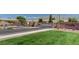 Stone pillars and wrought iron gates at the entrance to the Silverlake at Silverstone Ranch community at 7204 Royal Melbourne Dr, Las Vegas, NV 89131