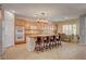 Well-appointed kitchen with an island, counter seating, and stainless steel appliances, perfect for cooking and entertaining at 7204 Royal Melbourne Dr, Las Vegas, NV 89131