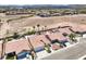 Features a charming home with a private pool, desert landscaping, and a classic tile roof at 7489 Crystal Clear Ave, Las Vegas, NV 89113
