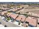 Features a charming home with a private pool, desert landscaping, and a classic tile roof at 7489 Crystal Clear Ave, Las Vegas, NV 89113