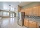 Bright open kitchen with tile floor and stainless appliances at 7489 Crystal Clear Ave, Las Vegas, NV 89113