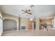 Bright open kitchen connects to living area with a fireplace at 7489 Crystal Clear Ave, Las Vegas, NV 89113
