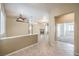 Bright living space featuring a fireplace and access to multiple rooms at 7489 Crystal Clear Ave, Las Vegas, NV 89113