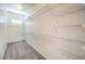 Carpeted walk-in closet with wall-mounted white wire shelving system at 7489 Crystal Clear Ave, Las Vegas, NV 89113