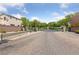 Welcoming gated entrance with a paved driveway and manicured landscaping for added security and appeal at 7589 Grassy Bank St, Las Vegas, NV 89139