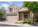 Charming two-story home with a well-maintained front yard and a two car garage at 7589 Grassy Bank St, Las Vegas, NV 89139
