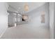 Spacious living area with vaulted ceiling, recessed lighting, and open floor plan at 7589 Grassy Bank St, Las Vegas, NV 89139