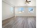 Large bonus room is brightly lit with lots of light, ready for your personal design at 7931 Campers Village Ave, Las Vegas, NV 89178