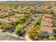 Aerial view of the community showcasing the layout, lush landscaping, and overall neighborhood charm at 7931 Campers Village Ave, Las Vegas, NV 89178
