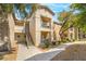 Well-maintained apartment complex with staircase access and mature trees at 8000 Badura Ave # 1058, Las Vegas, NV 89113
