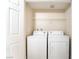Convenient in-unit laundry area with a washer and dryer and overhead storage at 8000 Badura Ave # 1058, Las Vegas, NV 89113