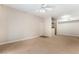Open-concept living room with adjoining kitchen, perfect for entertaining at 8000 Badura Ave # 1058, Las Vegas, NV 89113
