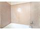 Close-up shot of the tiled shower showcasing its clean and modern design at 8000 Badura Ave # 1058, Las Vegas, NV 89113