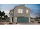 Two-story home features gray stucco, desert landscaping, an attached two-car garage and a covered entryway at 8118 Beebrush Ct, Las Vegas, NV 89113