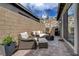 A relaxing patio with comfortable seating and a grill, perfect for outdoor entertainment at 897 Woodburn Ln, Las Vegas, NV 89138