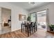 Bright dining area with patio access, complemented by a view of the bedroom suite at 897 Woodburn Ln, Las Vegas, NV 89138