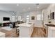 Kitchen island that connects to the Gathering room in an open concept plan at 897 Woodburn Ln, Las Vegas, NV 89138