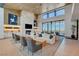 Stylish living room features a stone fireplace, modern lighting, and scenic views at 897 Woodburn Ln, Las Vegas, NV 89138