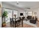 Open floor plan living space seamlessly connects indoor and outdoor areas for easy living at 897 Woodburn Ln, Las Vegas, NV 89138