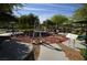 This park features fitness equipment and shaded seating areas at 9343 Leaping Deer Pl # 103, Las Vegas, NV 89178