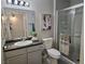 Clean bathroom featuring a sink with dark countertops and a glass-enclosed shower at 950 Seven Hills Dr # 2313, Henderson, NV 89052
