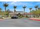 Horizons at Seven Hills community entrance featuring mature trees, landscaping, and community building at 950 Seven Hills Dr # 2313, Henderson, NV 89052