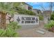Community sign for Horizons at Seven Hills featuring lush landscaping and attractive building architecture at 950 Seven Hills Dr # 2313, Henderson, NV 89052
