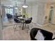 Stylish dining area featuring modern lighting, a sleek table, and ample seating for entertaining at 950 Seven Hills Dr # 2313, Henderson, NV 89052