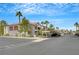 Condominium exterior with convenient parking and beautiful landscaping, located in a gated community at 950 Seven Hills Dr # 2313, Henderson, NV 89052