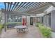Outdoor patio area with seating, vending machine, and surrounding landscaping at 950 Seven Hills Dr # 2313, Henderson, NV 89052
