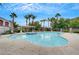 Resort-style community pool surrounded by lush greenery and inviting lounge areas at 950 Seven Hills Dr # 2313, Henderson, NV 89052