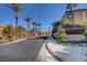 Street view of the Horizons at Seven Hills community featuring mature landscaping and tree-lined roads at 950 Seven Hills Dr # 2313, Henderson, NV 89052