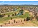 Wide aerial view featuring a golf course community, showcasing the lush green spaces and scenic surroundings at 9540 Eagle Valley Dr, Las Vegas, NV 89134