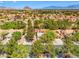 Scenic aerial view of the residential community, complete with golf course and mountain backdrop at 9540 Eagle Valley Dr, Las Vegas, NV 89134