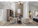 Bright living room with a modern fireplace, open concept design, and neutral tones, creating a cozy atmosphere at 9540 Eagle Valley Dr, Las Vegas, NV 89134