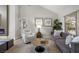 Comfortable living room area with natural light and modern finishes at 9540 Eagle Valley Dr, Las Vegas, NV 89134