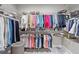 Spacious walk-in closet with ample storage for clothes, shoes, and accessories, perfect for organized living at 9540 Eagle Valley Dr, Las Vegas, NV 89134