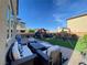 Beautifully landscaped backyard features a playground, swing set, and plenty of patio seating at 10152 Tenaya Meadows St, Las Vegas, NV 89178