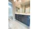 Bathroom features a sleek vanity with dual sinks and a shower/tub combination at 10152 Tenaya Meadows St, Las Vegas, NV 89178