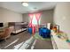 bedroom with bunk beds, play tent, and a cozy desk for studying and playtime at 10152 Tenaya Meadows St, Las Vegas, NV 89178