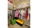 Walk-in closet offers ample storage space with rods, shelves, and bins for organization at 10152 Tenaya Meadows St, Las Vegas, NV 89178