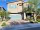 Charming two-story home features a two-car garage, tidy landscaping, and inviting front porch at 10152 Tenaya Meadows St, Las Vegas, NV 89178