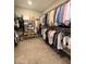 Spacious walk-in closet with organized storage solutions and ample hanging space for clothes at 10152 Tenaya Meadows St, Las Vegas, NV 89178