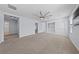 Upstairs loft featuring neutral carpet and plenty of light at 10373 Northern Hills Ave, Las Vegas, NV 89166