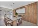 Bright kitchen with a large island, featuring bar stool seating, modern appliances, and ample storage at 10528 Garden Light Dr, Las Vegas, NV 89135