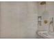 Contemporary shower featuring a rainfall showerhead, built-in niche, and a comfortable bench at 10528 Garden Light Dr, Las Vegas, NV 89135