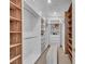 Well-organized walk-in closet with custom shelving and ample storage space at 10528 Garden Light Dr, Las Vegas, NV 89135